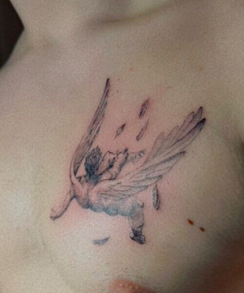 tatuaż męski na piersi
